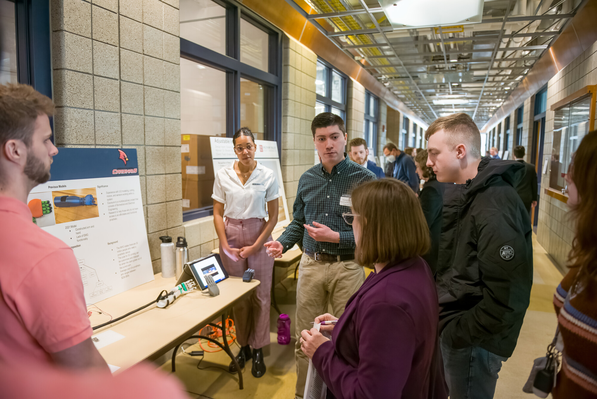 Group of people looking at presentation board